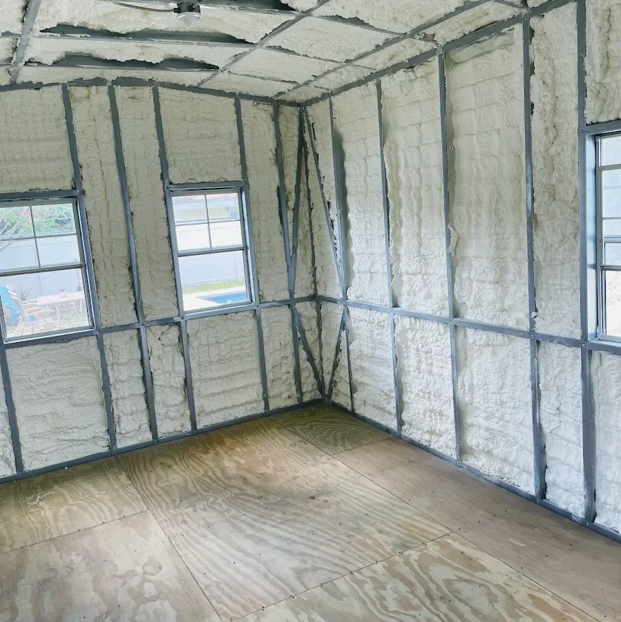 Closed-cell spray foam insulation applied to wall cavities in a residential project in Channelview